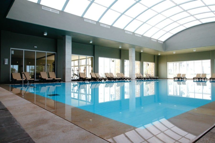 Swimming pool area at Hotel Riu Tikida Dunas