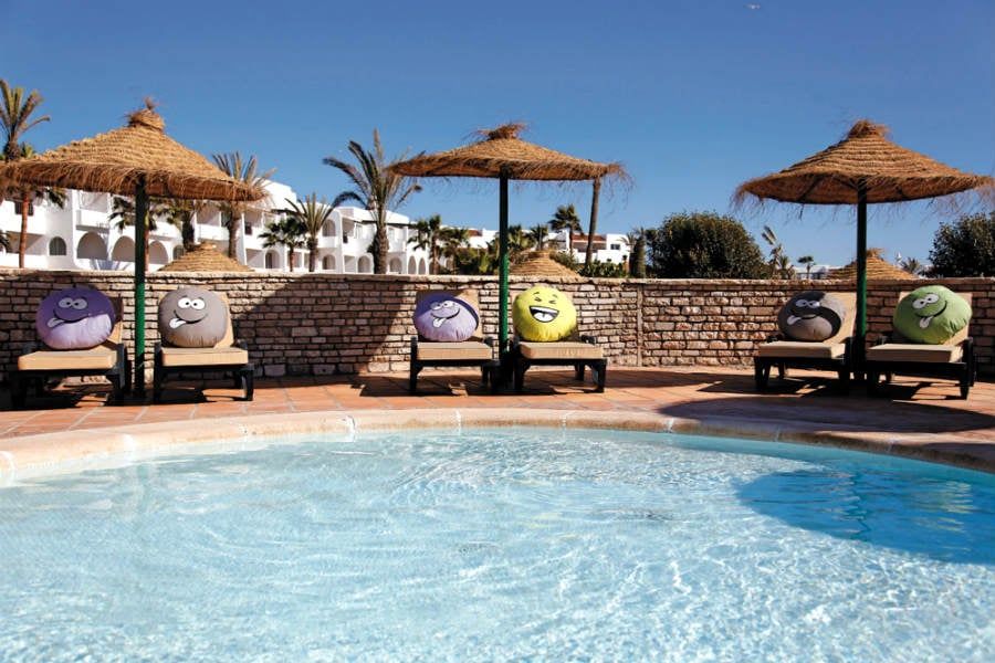 Swimming pool area at Hotel Riu Tikida Dunas
