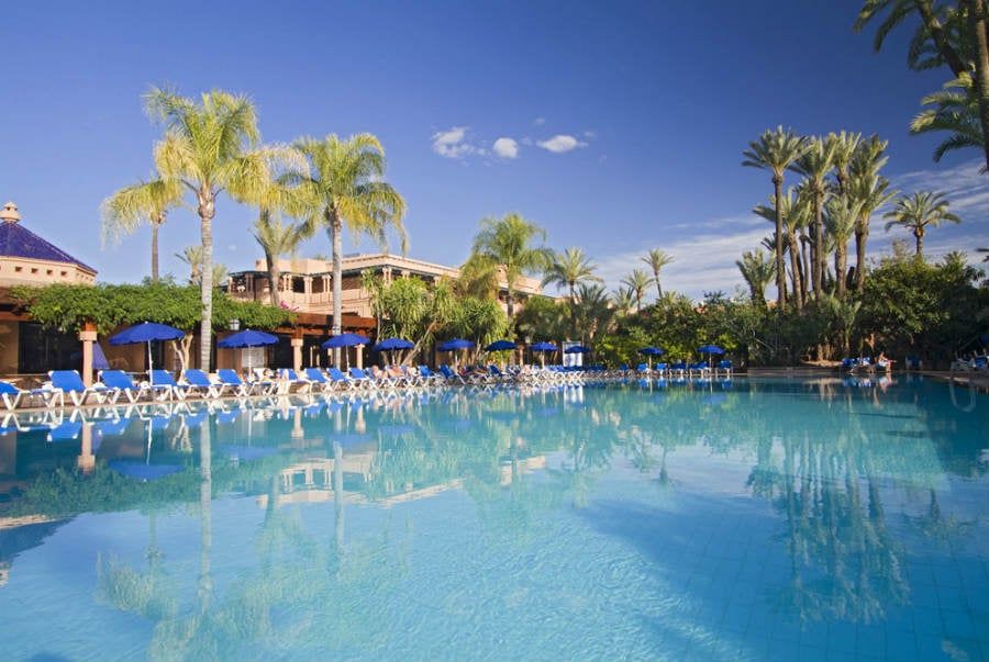 Swimming pool area at Hotel Riu Tikida Garden