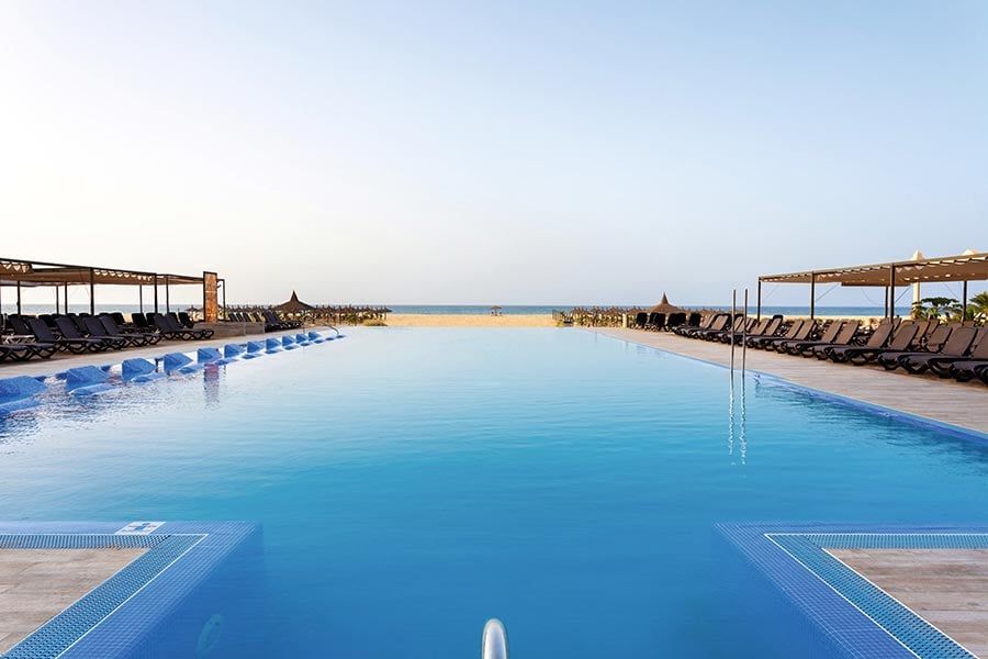 Swimming pool area at Hotel Riu Touareg