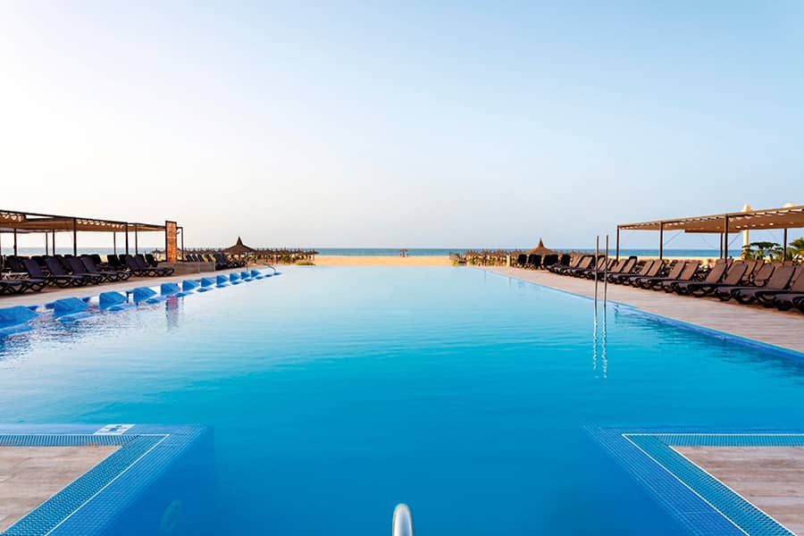 Swimming pool area at Hotel Riu Touareg
