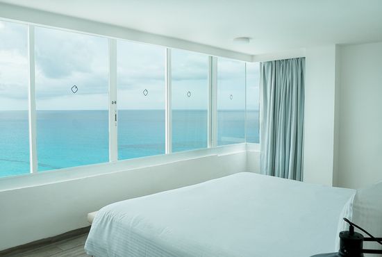 ÓLEO Cancún Playa Rooms & Suites