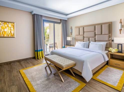 Guest room at Rixos Premium Magawish Suites and Villas