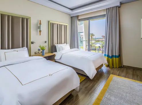 Guest room at Rixos Premium Magawish Suites and Villas