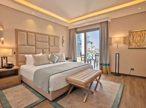 Guest room at Rixos Premium Magawish Suites and Villas