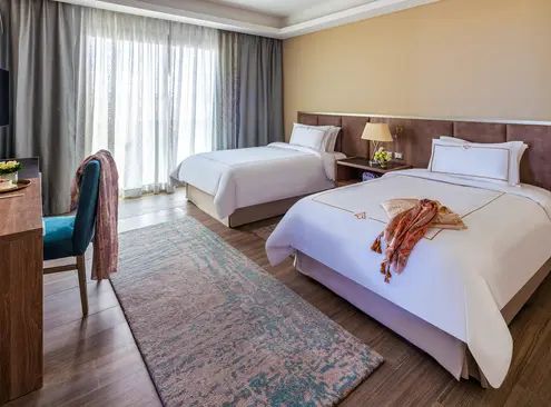 Guest room at Rixos Premium Magawish Suites and Villas