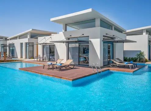 Guest room at Rixos Premium Magawish Suites and Villas