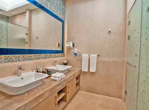 Guest room at Rixos Premium Magawish Suites and Villas