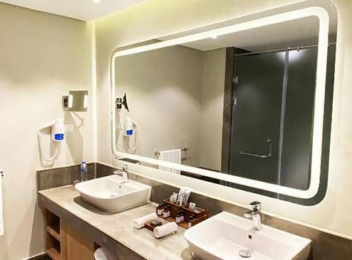 Guest room at Rixos Premium Magawish Suites and Villas