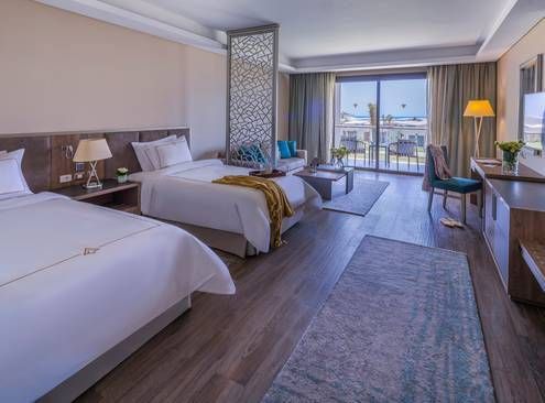 Guest room at Rixos Premium Magawish Suites and Villas