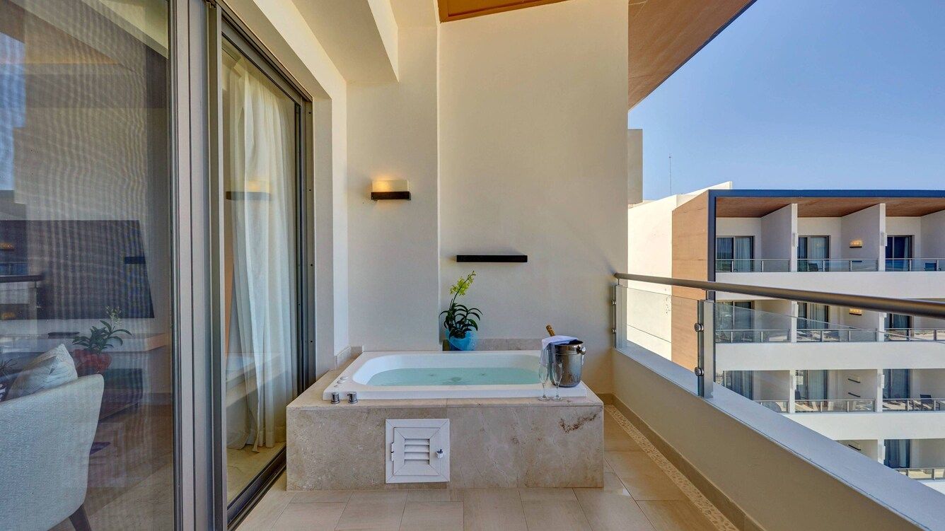Guest room at Royalton Blue Waters Montego Bay, Autograph Collection All-Inclusive Resort
