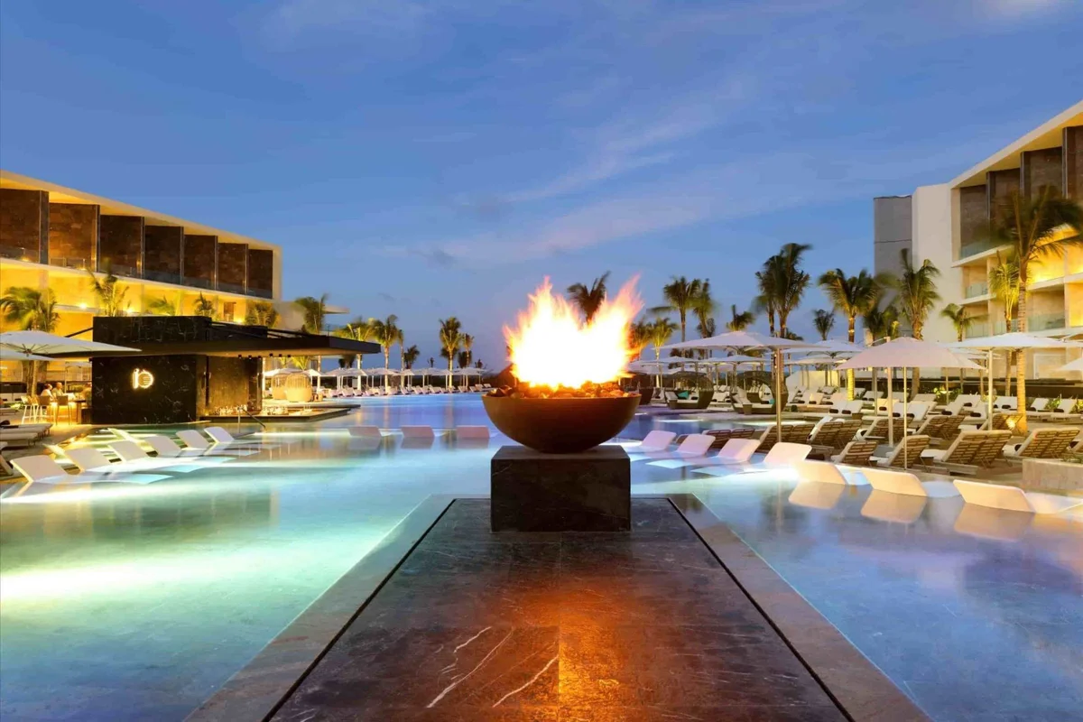 TRS Coral Hotel exclusive swimming pool with loungers and tropical surroundings