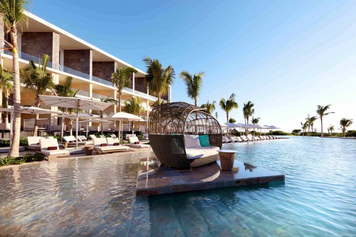 Adults-only pool area at TRS Coral with swim-up bar and Caribbean views