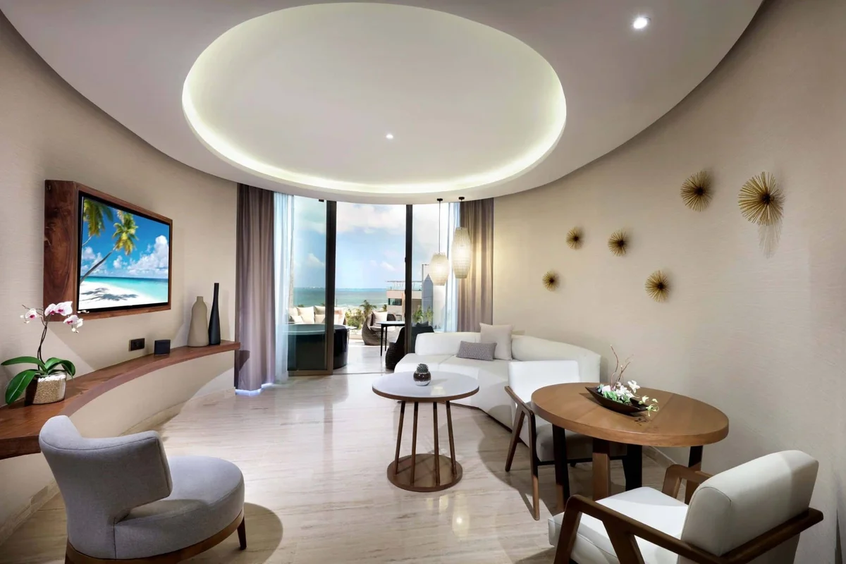 Loft Suite with jacuzzi terrace and ocean view — duplex design with living area and bedroom