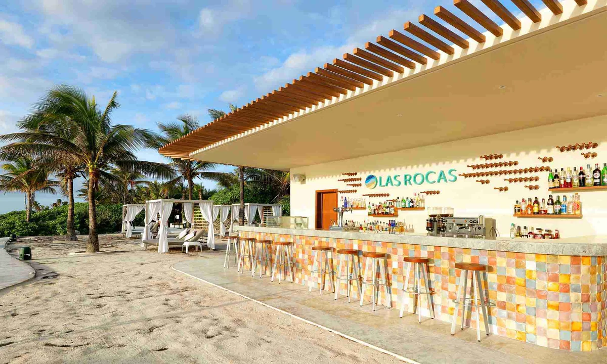 Las Rocas oceanfront area with Caribbean Sea views and Balinese daybeds