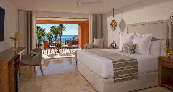 Hacienda-style suite with Antigua furnishings, Le Labo amenities, and ocean-view terrace